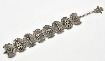 Lot 134 - An Indian white metal bracelet, decorated with...