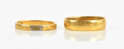 Lot 393 - Two 22ct yellow gold wedding bands, size K and...
