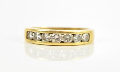 Lot 392 - An 18ct yellow gold diamond set half eternity...