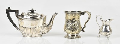 Lot 2464 - A Victorian hallmarked silver teapot with...