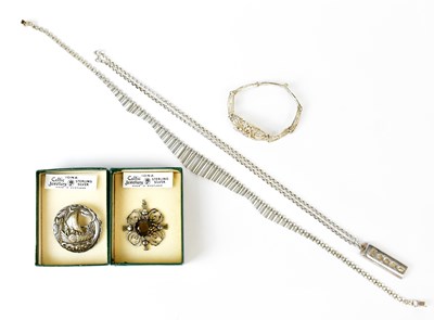 Lot 895 - A collection of silver jewellery, comprising a...