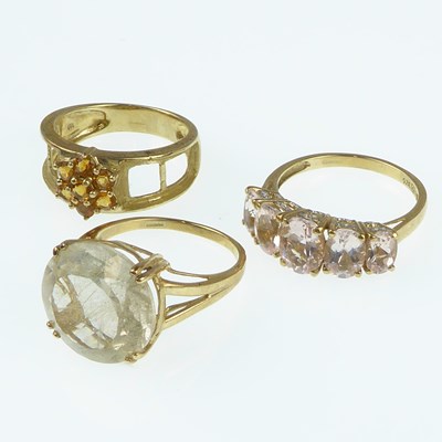 Lot 1098 - Three 9ct gold dress rings, one with large cut...