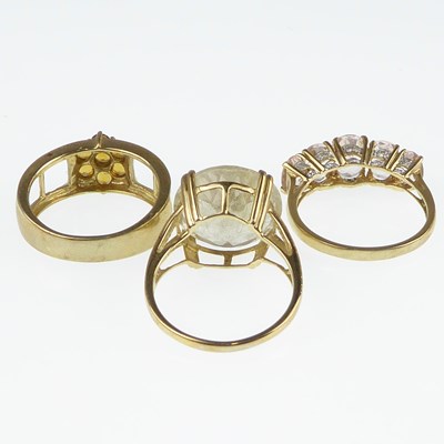 Lot 1098 - Three 9ct gold dress rings, one with large cut...