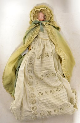Lot 513 - A German three-faced bisque headed doll, with...