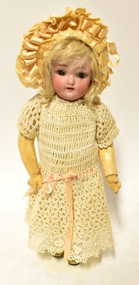 Lot 559 - SIMON & HALBIG; a bisque head 'walking' doll,...
