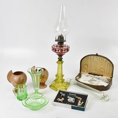Lot 1744 - An Art Deco uranium glass oil lamp, with...