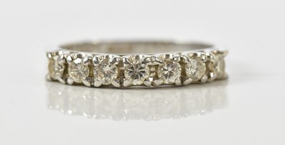 Lot 355 - A white metal diamond set seven stone half...