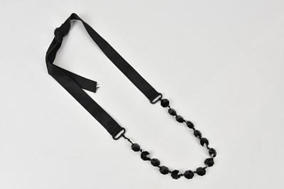 Lot 738 - LANVIN; an unusual heavy black crystal glass...