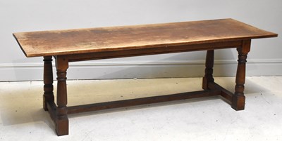 Lot 1024 - An early 20th century oak refectory table,...