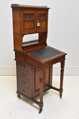 Lot 1107 - An Edwardian mahogany bureau cupboard, the...