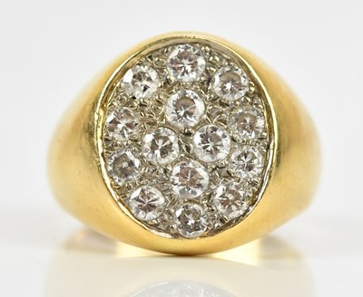 Lot 324 - A yellow metal diamond set dress ring, stamped...