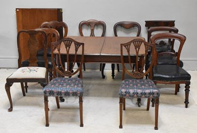 Lot 101 - A Victorian mahogany extending dining table on...
