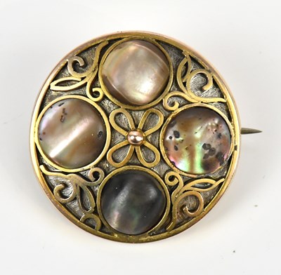Lot 96 - A Victorian yellow metal circular shield type...