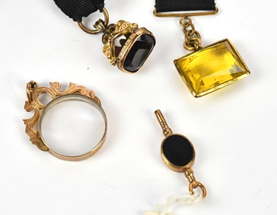Lot 10 - A Victorian gold plated fob seal with amethyst...