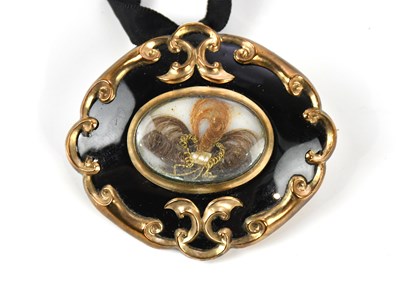 Lot 71 - A good Victorian yellow metal and black enamel...