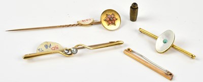 Lot 73 - A Victorian yellow metal bar brooch, stamped...