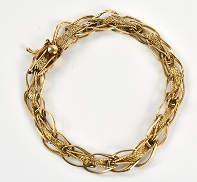 Lot 30 - A yellow metal filigree bracelet, stamped '14K'...