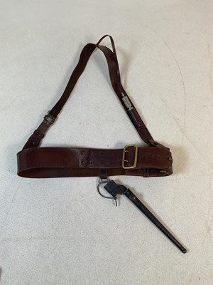 Lot 238 - A Sam Browne belt, with cross strap and...