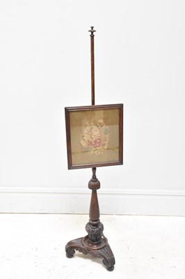 Lot 1166 - A 19th century mahogany pole screen, height...