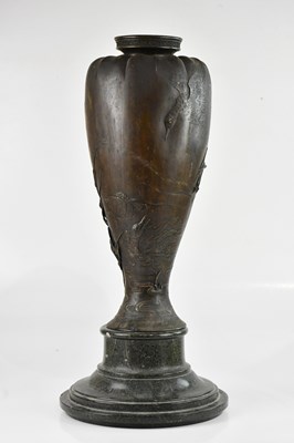 Lot 1180 - A large Japanese bronze floor vase, relief...