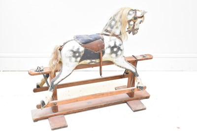 Lot 1419 - An early 20th century painted wooden rocking...