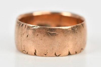 Lot 473 - A 9ct rose gold wedding band, size I 1/2,...