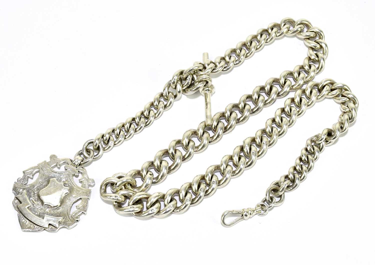 Lot 1846 - A silver graduated curb link Albert chain,...