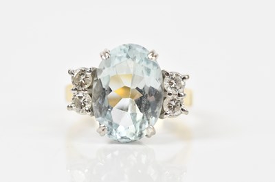 Lot 337 - An 18ct yellow gold diamond and aquamarine set...