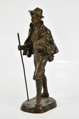 Lot 1490 - A bronze figure of shepherd boy carrying lamb,...