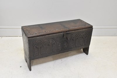 Lot 1088 - A 17th century carved oak blanket box, height...