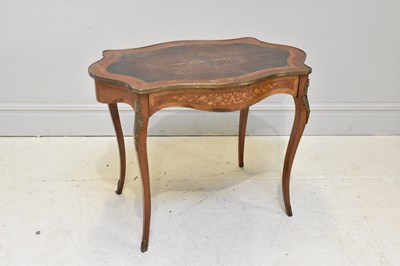 Lot 1089 - A 19th century mahogany inlaid writing table...