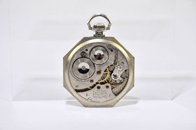 Lot 1814 - WALTHAM; a white metal crown wind pocket watch,...