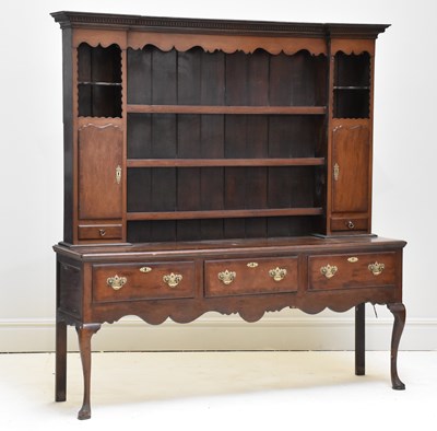 Lot 35 - A late 18th century crossbanded oak dresser,...