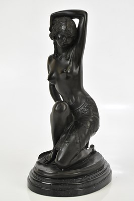 Lot 1506 - A reproduction bronze effect figure of female...