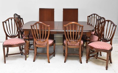 Lot 1041 - A reproduction mahogany extending dining table,...