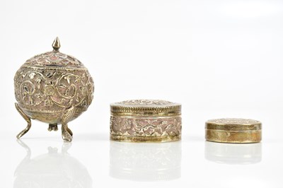 Lot 2116 - An Indian white metal lidded pepper pot, with...