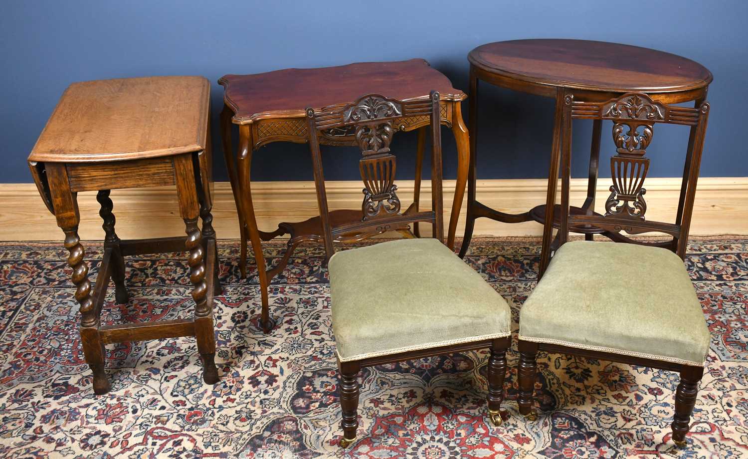 Lot 2873 - A 1920s drop-leaf dining table on barley twist...