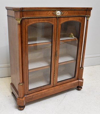 Lot 1070 - A 19th century French inlaid walnut pier...