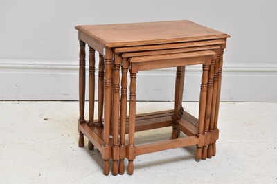Lot 1049 - A modern nest of four inlaid tables, height...