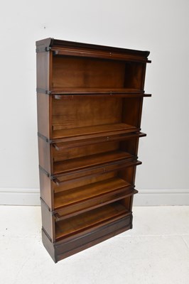 Lot 1091 - AMYL; a five section stacking bookcase, height...