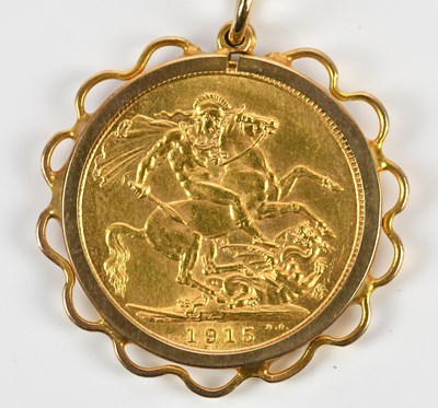 Lot 223 - A George V full sovereign, 1915, in loose...