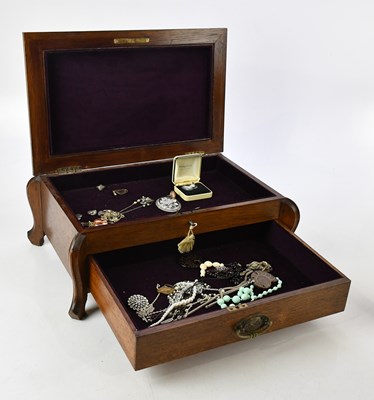 Lot 150 - An oak box containing a small selection of...