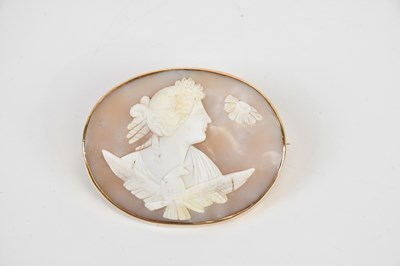 Lot 64 - A Victorian yellow metal mounted cameo brooch,...