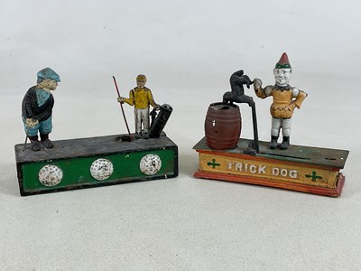 Lot 54 - Two cast metal mechanical coin banks, 'Birdie...