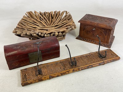 Lot 25 - A group of decorative wooden items, comprising...