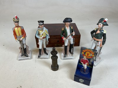 Lot 236 - Four porcelain figures of military soldiers, a...