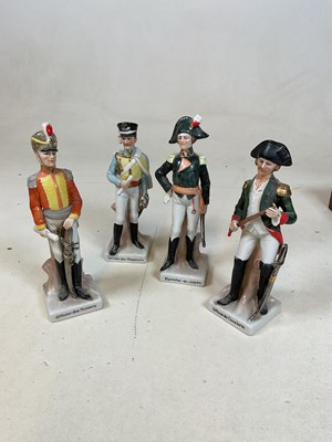 Lot 236 - Four porcelain figures of military soldiers, a...