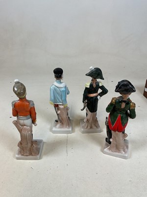 Lot 236 - Four porcelain figures of military soldiers, a...