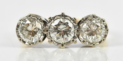 Lot 328 - An 18ct yellow gold diamond set three stone...