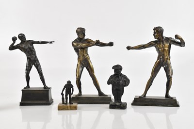 Lot 1501 - Three decorative bronzed spelter figures...